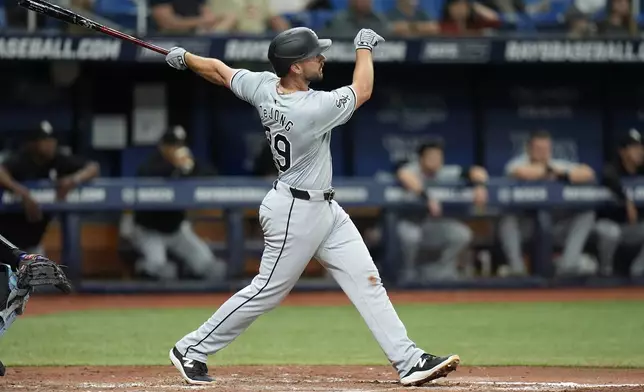 Chicago White Sox's Paul DeJong watches his two-run home run off Tampa Bay Rays starting pitcher Aaron Civale during the fifth inning of a baseball game Wednesday, May 8, 2024, in St. Petersburg, Fla. (AP Photo/Chris O'Meara)