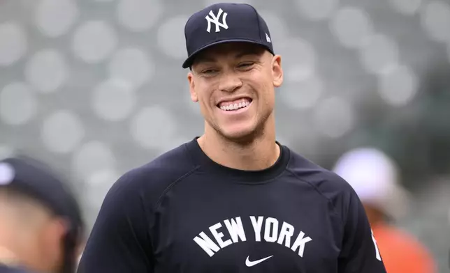New York Yankees' Aaron Judge laughs before a baseball game against the Baltimore Orioles, Tuesday, April 30, 2024, in Baltimore. (AP Photo/Nick Wass)
