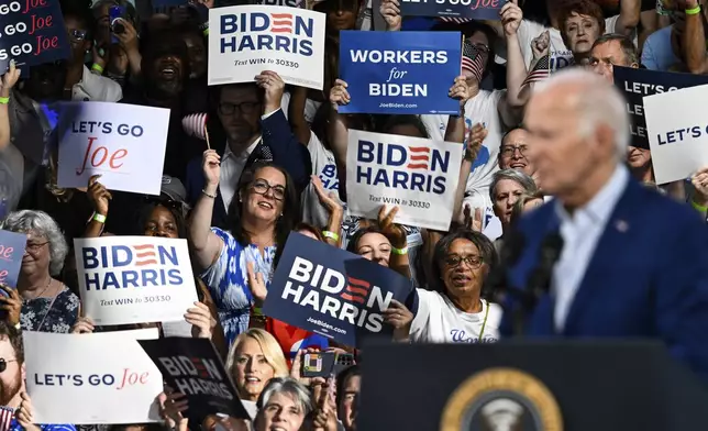 Supporters cheer as President Joe Biden speaks at a campaign rally in Raleigh, N.C., Friday, June. 28, 2024. (AP Photo/Matt Kelley)