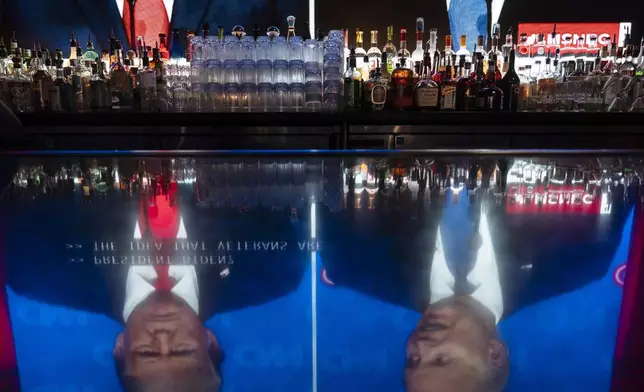 Liquor bottles are placed on a back bar at the Abbey Food &amp; Bar in West Hollywood, Calif., Thursday, June 27, 2024, as a presidential debate between President Joe Biden and Republican presidential candidate, former President Donald Trump, is broadcast. (AP Photo/Jae C. Hong)