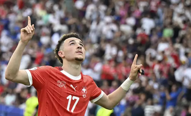 Switzerland's Ruben Vargas after scoring his side's second goal during a round of sixteen match between Switzerland and Italy at the Euro 2024 soccer tournament in Berlin, Germany, Saturday, June 29, 2024. (Robert Michael/dpa via AP)
