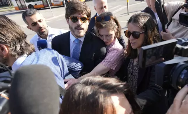 Amanda Knox arrives at the Florence courtroom in Florence, Italy, Wednesday, June 5, 2024. Amanda Knox returns to an Italian courtroom Wednesday for the first time in more than 12½ years to clear herself "once and for all" of a slander charge that stuck even after she was exonerated in the brutal 2007 murder of her British roommate in the idyllic hilltop town of Perugia. (AP Photo/Antonio Calanni)