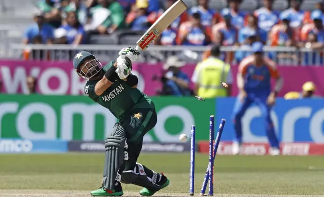 Pakistan's Mohammad Rizwan is bowled out by India's Jasprit Bumrah during the ICC Men's T20 World Cup cricket match between India and Pakistan at the Nassau County International Cricket Stadium in Westbury, New York, Sunday, June 9, 2024. (AP Photo/Eduardo Munoz)