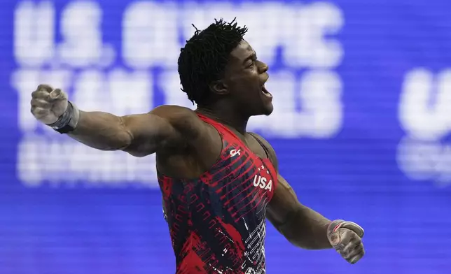 Frederick Richard celebrates after competing on the pommel horse at the United States Gymnastics Olympic Trials on Saturday, June 29, 2024, in Minneapolis. (AP Photo/Charlie Riedel)