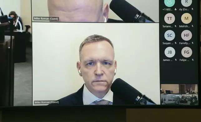 Trump 2020 Election Day operations director Michael Roman appears via video during his arraignment in Maricopa County Superior Court, Friday, June 7, 2024, in Phoenix. Roman pleaded not guilty Friday to nine felony charges for his role in an effort to overturn Trump's Arizona election loss to Joe Biden. (Mark Henle/The Arizona Republic via AP)