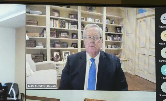 Mark Meadows, former Chief of Staff to President Donald Trump, appears via video during his arraignment in Maricopa County Superior Court, Friday, June 7, 2024, in Phoenix. Meadows pleaded not guilty Friday to nine felony charges for his role in an effort to overturn Trump's Arizona election loss to Joe Biden. (Mark Henle/The Arizona Republic via AP)