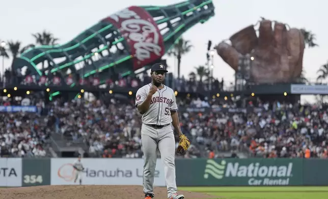 Houston Astros pitcher Ronel Blanco reacts after striking out San Francisco Giants' Matt Chapman to end the sixth inning of a baseball game in San Francisco, Tuesday, June 11, 2024. (AP Photo/Jeff Chiu)