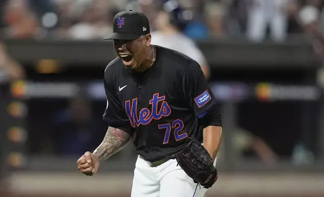 New York Mets pitcher Dedniel Núñez celebrates after an out during the seventh inning of the team's baseball game against the Houston Astros, Friday, June 28, 2024, in New York. (AP Photo/Frank Franklin II)