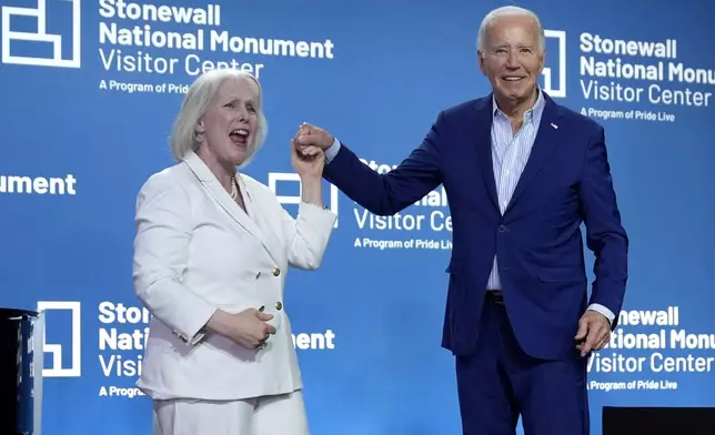 President Joe Biden, right, poses with Sen. Kirsten Gillibrand, D-N.Y., at the grand opening ceremony for the Stonewall National Monument Visitor Center, Friday, June 28, 2024, in New York. (AP Photo/Evan Vucci)