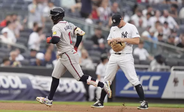 Atlanta Braves' Ozzie Albies (1) runs the bases after hitting a two-run home run against the New York Yankees during the first inning of a baseball game Friday, June 21, 2024, in New York. (AP Photo/Frank Franklin II)
