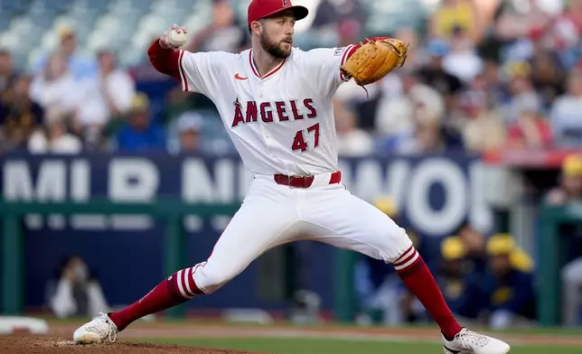Los Angeles Angels starting pitcher Griffin Canning throws during the first inning of the team's baseball game against the Milwaukee Brewers, Tuesday, June 18, 2024, in Anaheim, Calif. (AP Photo/Ryan Sun)
