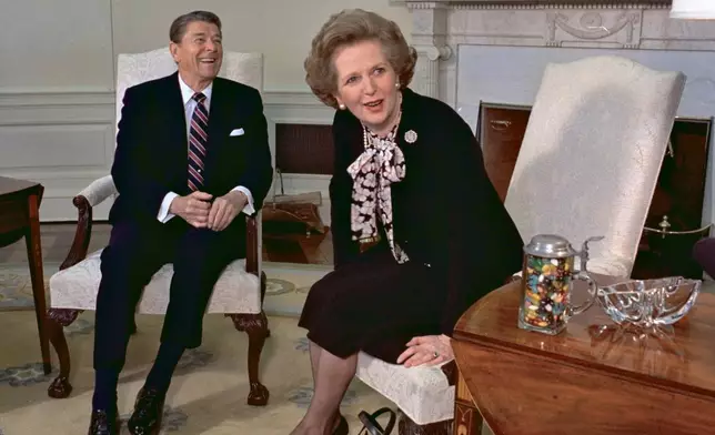 FILE - British Prime Minister Margaret Thatcher meets with US President Ronald Reagan at the White House in Washington, Feb. 20, 1985. Britain’s upcoming general election on July 4, 2024, is widely expected to lead to a change of government for the first time in 14 years. Britain's general election in 1979 is without doubt the most consequential since 1945, with Margaret Thatcher becoming the country’s first female prime minister on a radical Conservative economic agenda. At its heart, Thatcherism represented a total rethink over the role of the state. (AP Photo/J. Scott Applewhite, File)
