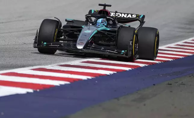 Mercedes driver George Russell of Britain steers his car during the Austrian Formula One Grand Prix race at the Red Bull Ring racetrack in Spielberg, Austria, Sunday, June 30, 2024. (AP Photo/Darko Bandic)
