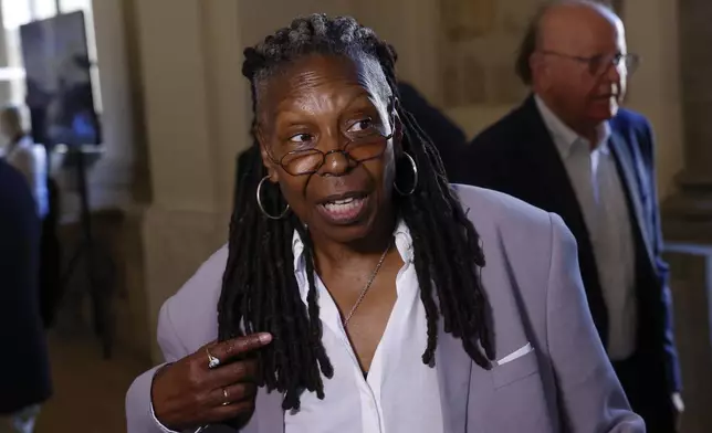 CAPTION CORRECTS LOCATION Whoopi Goldberg is interviewed after an audience with Pope Francis in Clementine Hall, at The Vatican, Friday, June 14, 2024. Pope Francis is meeting with over 100 comedians from 15 countries aiming to establish a link between the Catholic Church and comic artists. (AP Photo/Riccardo De Luca)
