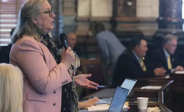 Kansas state Sen. Molly Baumgardner, R-Louisburg, asks questions during the Senate debate about the details of a proposal aimed at luring the Kansas City Chiefs from Missouri, Tuesday, June 18, 2024, at the Statehouse in Topeka, Kansas. The proposal would authorize state bonds to help the Super Bowl champion Chiefs and Major League Baseball's Kansas City Royals finance new stadiums in Kansas. (AP Photo/John Hanna)