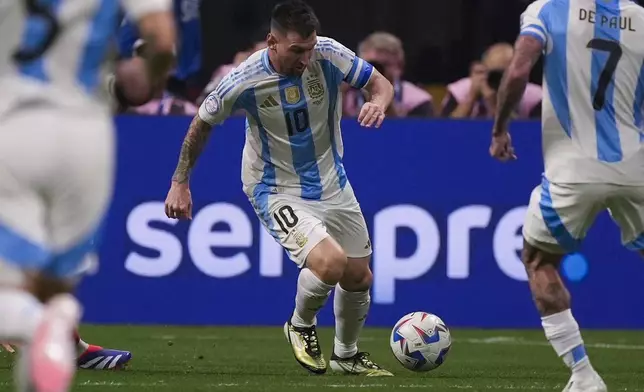 Argentina's Lionel Messi controls the ball during a Copa America Group A soccer match against Canada in Atlanta, Thursday, June 20, 2024. (AP Photo/Mike Stewart)