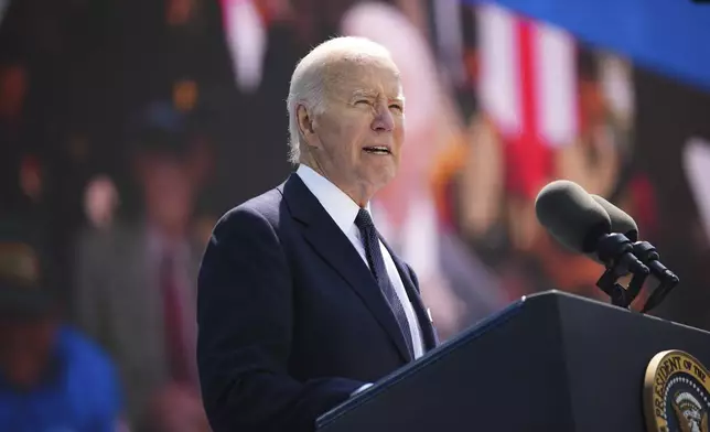 President Joe Biden delivers a speech during a commemorative ceremony to mark D-Day 80th anniversary, Thursday, June 6, 2024 at the US cemetery in Colleville-sur-Mer, Normandy. Normandy is hosting various events to officially commemorate the 80th anniversary of the D-Day landings that took place on June 6, 1944. (AP Photo/Daniel Cole, Pool)