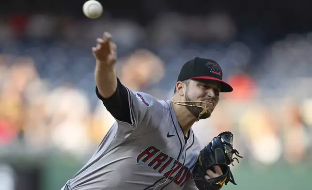 Arizona Diamondbacks starting pitcher Slade Cecconi throws to a Washington Nationals batter during the first inning of a baseball game Tuesday, June 18, 2024, in Washington. (AP Photo/John McDonnell)