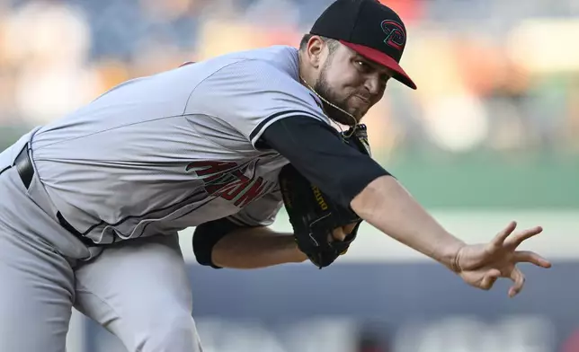 Arizona Diamondbacks starting pitcher Slade Cecconi follows through during the first inning of the team's baseball game against the Washington Nationals on Tuesday, June 18, 2024, in Washington. (AP Photo/John McDonnell)