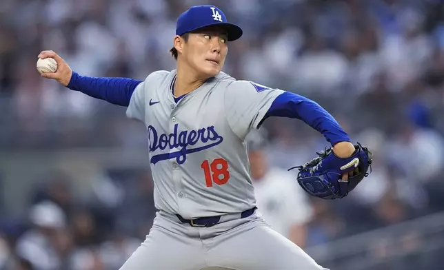 Los Angeles Dodgers' Yoshinobu Yamamoto pitches during the first inning of the team's baseball game against the New York Yankees, Friday, June 7, 2024, in New York. (AP Photo/Frank Franklin II)