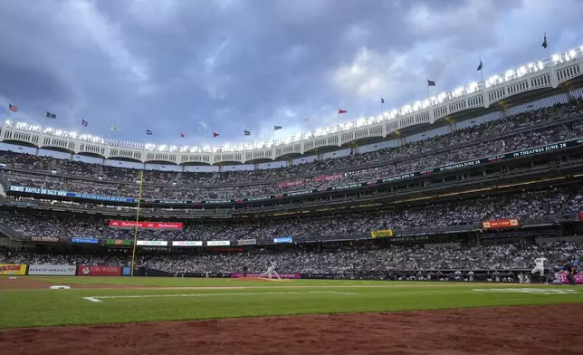 Los Angeles Dodgers' Yoshinobu Yamamoto pitches to New York Yankees' Aaron Judge during the first inning of a baseball game Friday, June 7, 2024, in New York. (AP Photo/Frank Franklin II)