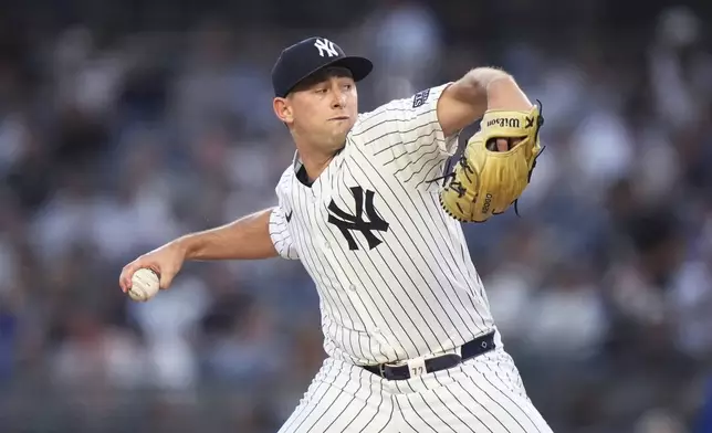 New York Yankees' Cody Poteet pitches to a Los Angeles Dodgers batter during the first inning of a baseball game Friday, June 7, 2024, in New York. (AP Photo/Frank Franklin II)