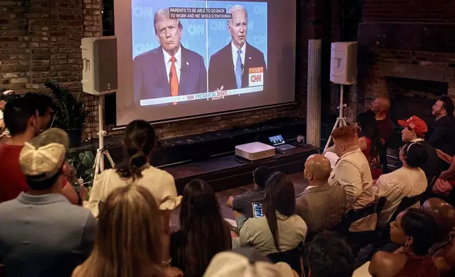Trump supporters listen during the Young Republicans' presidential debate watch party on Thursday, June 27, 2024, in New York as President Joe Biden faces former President Donald Trump during the first presidential debate ahead of the 2024 elections. (AP Photo/Andres Kudacki)