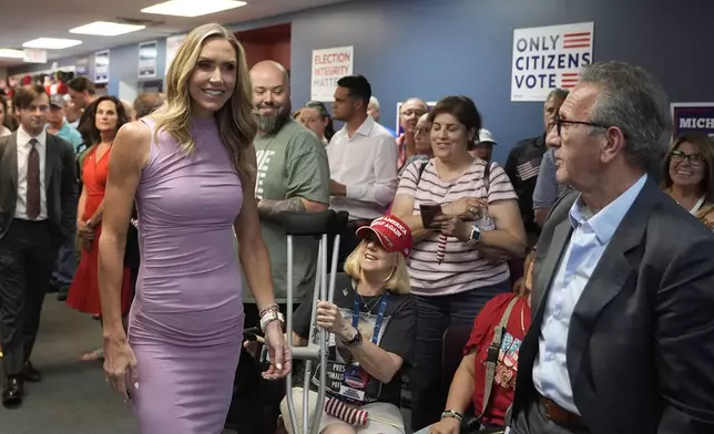 Republican National Committee co-chair Lara Trump arrives to kickoff an election integrity volunteer training at the Oakland County GOP Headquarters, Friday, June 14, 2024 in Bloomfield Hills, Mich. (AP Photo/Carlos Osorio)