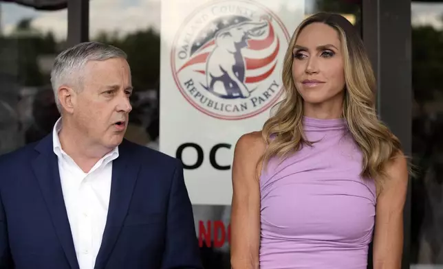 Republican National Committee co-chairs Michael Whatley and Lara Trump addresses the media at the Oakland County GOP Headquarters, Friday, June 14, 2024 in Bloomfield Hills, Mich. (AP Photo/Carlos Osorio)