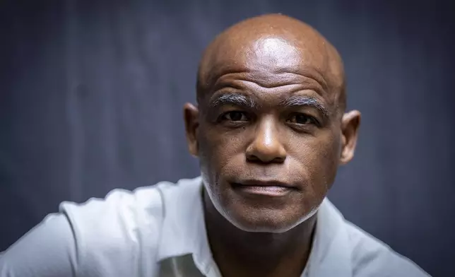 Gene Folkes, a former contestant on "The Apprentice," is photographed in a park in downtown Manhattan on Wednesday, June 5, 2024, in New York. A producer's new account of Donald Trump's behavior on "The Apprentice" is resurfacing allegations about whether he mistreated Black people who appeared on the show. (AP Photo/Stefan Jeremiah)