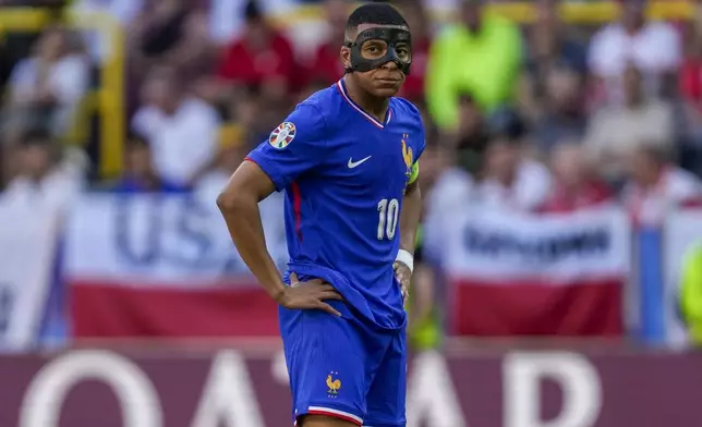 Kylian Mbappe of France during a Group D match between the France and Poland at the Euro 2024 soccer tournament in Dortmund, Germany, Tuesday, June 25, 2024. (AP Photo/Darko Vojinovic)