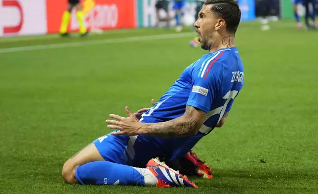 Italy's Mattia Zaccagni celebrates after scoring during a Group B match between Croatia and Italy at the Euro 2024 soccer tournament in Leipzig, Germany, Monday, June 24, 2024. (AP Photo/Petr David Josek)
