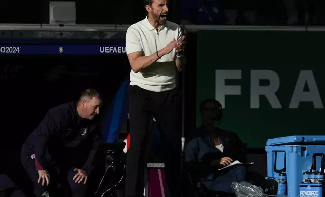 England's manager Gareth Southgate yells during a Group C match between Denmark and England at the Euro 2024 soccer tournament in Frankfurt, Germany, Thursday, June 20, 2024. (AP Photo/Themba Hadebe)