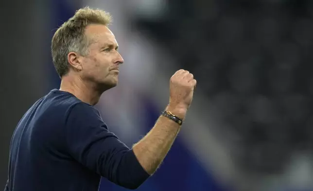 Denmark's head coach Kasper Hjulmand gestures after a Group C match between Denmark and England at the Euro 2024 soccer tournament in Frankfurt, Germany, Thursday, June 20, 2024. (AP Photo/Michael Probst)