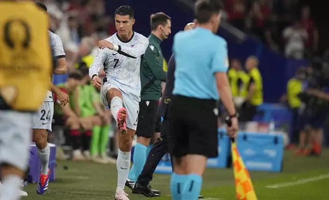 Portugal's Cristiano Ronaldo reacts after leaving the pitch during a Group F match between Georgia and Portugal at the Euro 2024 soccer tournament in Gelsenkirchen, Germany, Wednesday, June 26, 2024. (AP Photo/Alessandra Tarantino)