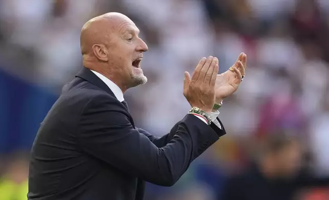 Hungary's coach Marco Rossi gestures during a Group A match between Germany and Hungary at the Euro 2024 soccer tournament in Stuttgart, Germany, Wednesday, June 19, 2024. (AP Photo/Antonio Calanni)