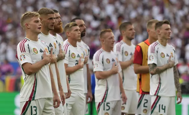 Hungary players cheer fans at the end of a Group A match between Germany and Hungary at the Euro 2024 soccer tournament in Stuttgart, Germany, Wednesday, June 19, 2024. (AP Photo/Antonio Calanni)