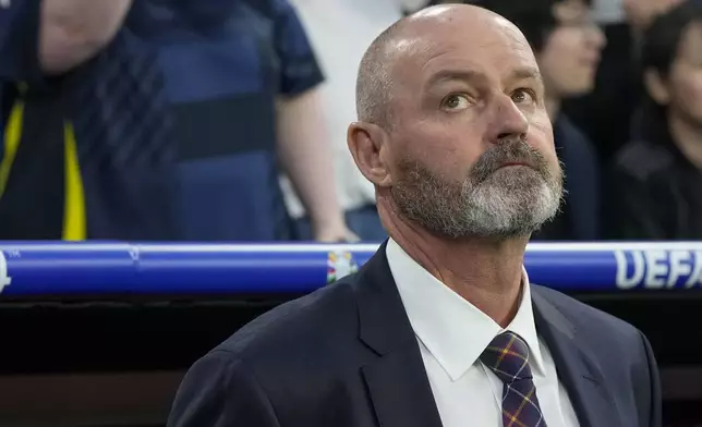 Scotland's manager Steve Clarke looks on prior a Group A match between Germany and Scotland at the Euro 2024 soccer tournament in Munich, Germany, Friday, June 14, 2024. (AP Photo/Antonio Calanni)