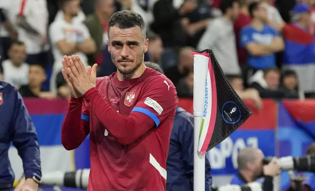 Serbia's Filip Kostic leaves the pitch after being substituted during a Group C match between Serbia and England at the Euro 2024 soccer tournament in Gelsenkirchen, Germany, Sunday, June 16, 2024. (AP Photo/Andreea Alexandru)