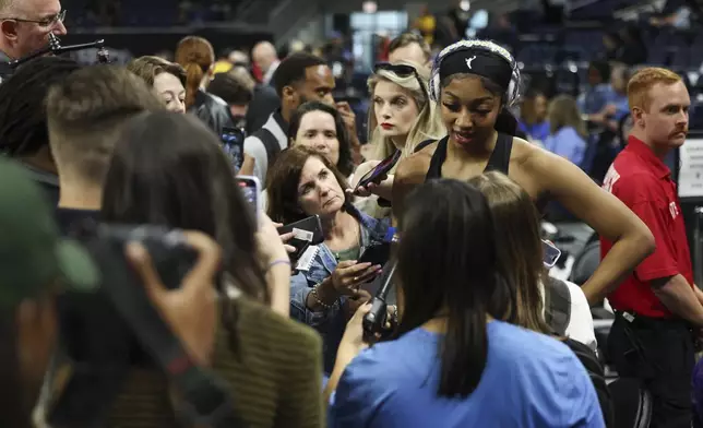 Chicago Sky forward Angel Reese answers questions before a WNBA basketball game against the Indiana Fever, Sunday, June 23, 2024, in Chicago. (Eileen T. Meslar/Chicago Tribune via AP)