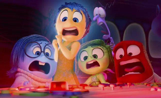 This image released by Disney/Pixar shows, from left, Sadness, voiced by Phyllis Smith, Joy, voiced by Amy Poehler, Disgust, voiced by Liza Lapira, Fear, voiced by Tony Hale and Anger, voiced by Lewis Black, in a scene from "Inside Out 2." (Disney/Pixar via AP)