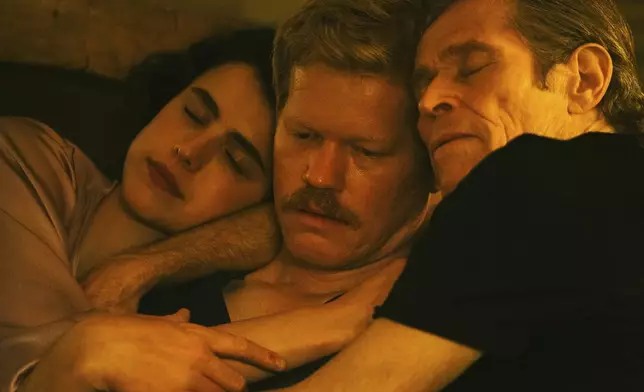 This image released by Searchlight Pictures shows Margaret Qualley, from left, Jesse Plemons and Willem Dafoe in a scene from "Kinds of Kindness." (Searchlight Pictures via AP)