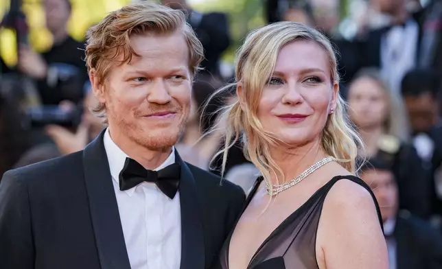 FILE - Jesse Plemons, left, and Kirsten Dunst pose for photographers upon arrival at the premiere of the film "Kinds of Kindness" at the 77th international film festival, Cannes, southern France on May 17, 2024. (Photo by Andreea Alexandru/Invision/AP, File)