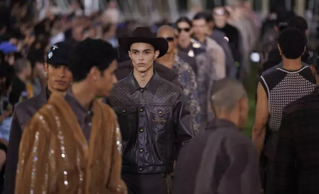 Models wear creations as part of the Louis Vuitton Spring Summer 2025 collection, that was presented in Paris, Tuesday, June 18, 2024. (Photo by Vianney Le Caer/Invision/AP)