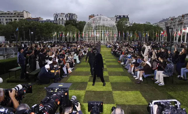 Models wear creations as part of the Louis Vuitton Spring Summer 2025 collection, that was presented in Paris, Tuesday, June 18, 2024. (Photo by Vianney Le Caer/Invision/AP)
