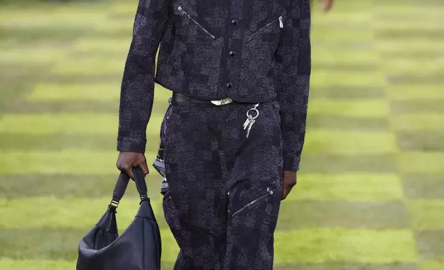 A model wears a creation as part of the Louis Vuitton Spring Summer 2025 collection, that was presented in Paris, France, Tuesday, June 18, 2024. (Photo by Vianney Le Caer/Invision/AP)