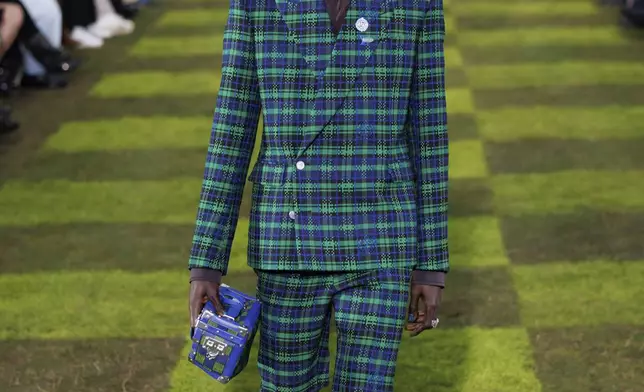 A model wears a creation as part of the Louis Vuitton Spring Summer 2025 collection, that was presented in Paris, Tuesday, June 18, 2024. (Photo by Vianney Le Caer/Invision/AP)