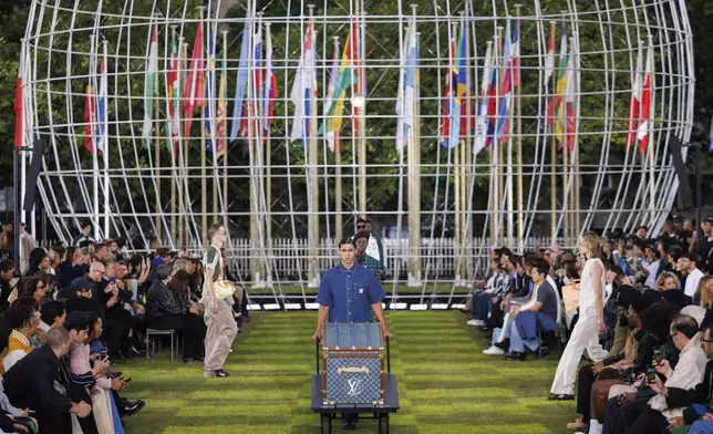 A model wears a creation as part of the Louis Vuitton Spring Summer 2025 collection, that was presented in Paris, Tuesday, June 18, 2024. (Photo by Vianney Le Caer/Invision/AP)