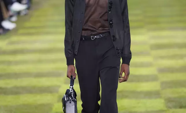 A model wears a creation as part of the Louis Vuitton Spring Summer 2025 collection, that was presented in Paris, Tuesday, June 18, 2024. (Photo by Vianney Le Caer/Invision/AP)