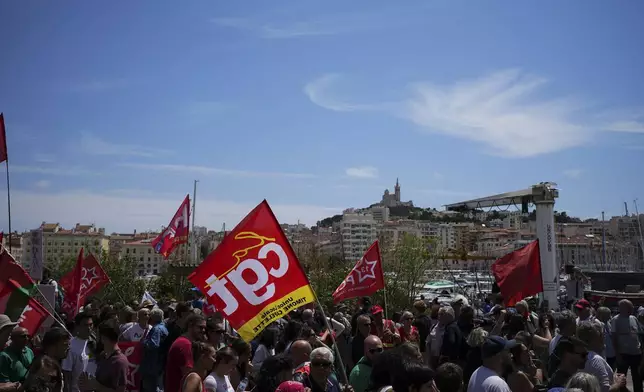 Protesters march during a demonstration in Marseille, southern France, Saturday, June 15, 2024. Anti-racism groups joined French unions and a brand-new left-wing coalition in protests in Paris and across France on Saturday against the surging nationalist far right as frenzied campaigning is underway ahead of snap parliamentary elections. (AP Photo/Daniel Cole)